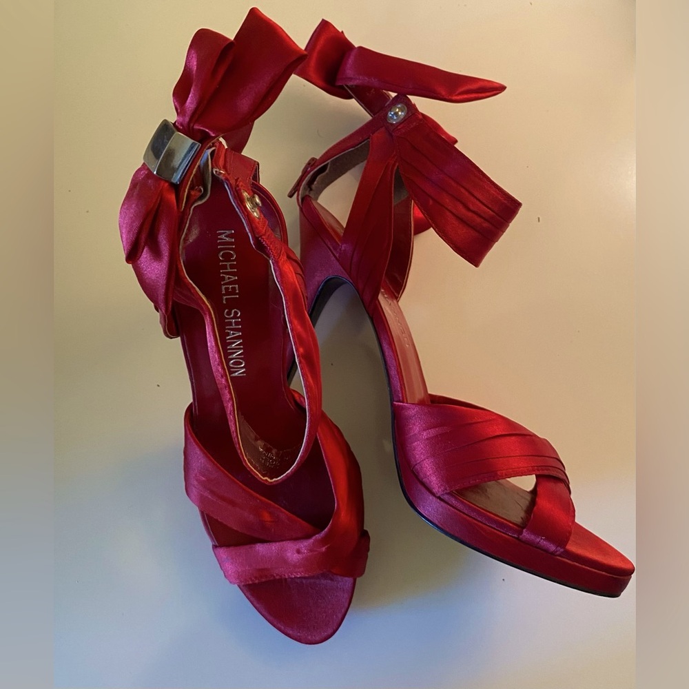 Red Michael Shannon heels with bow back and 4 inch heel (size 6)